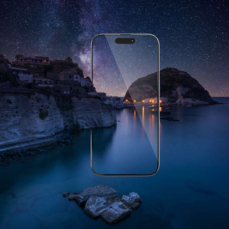 MOCOLL Magic Installer easy apply screen protector displayed over scenic night coastal landscape background