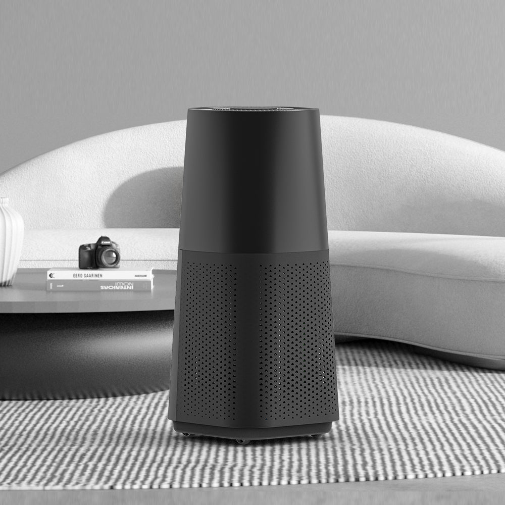 Portable air purifier for home with sleek black design and quiet efficient air filtration